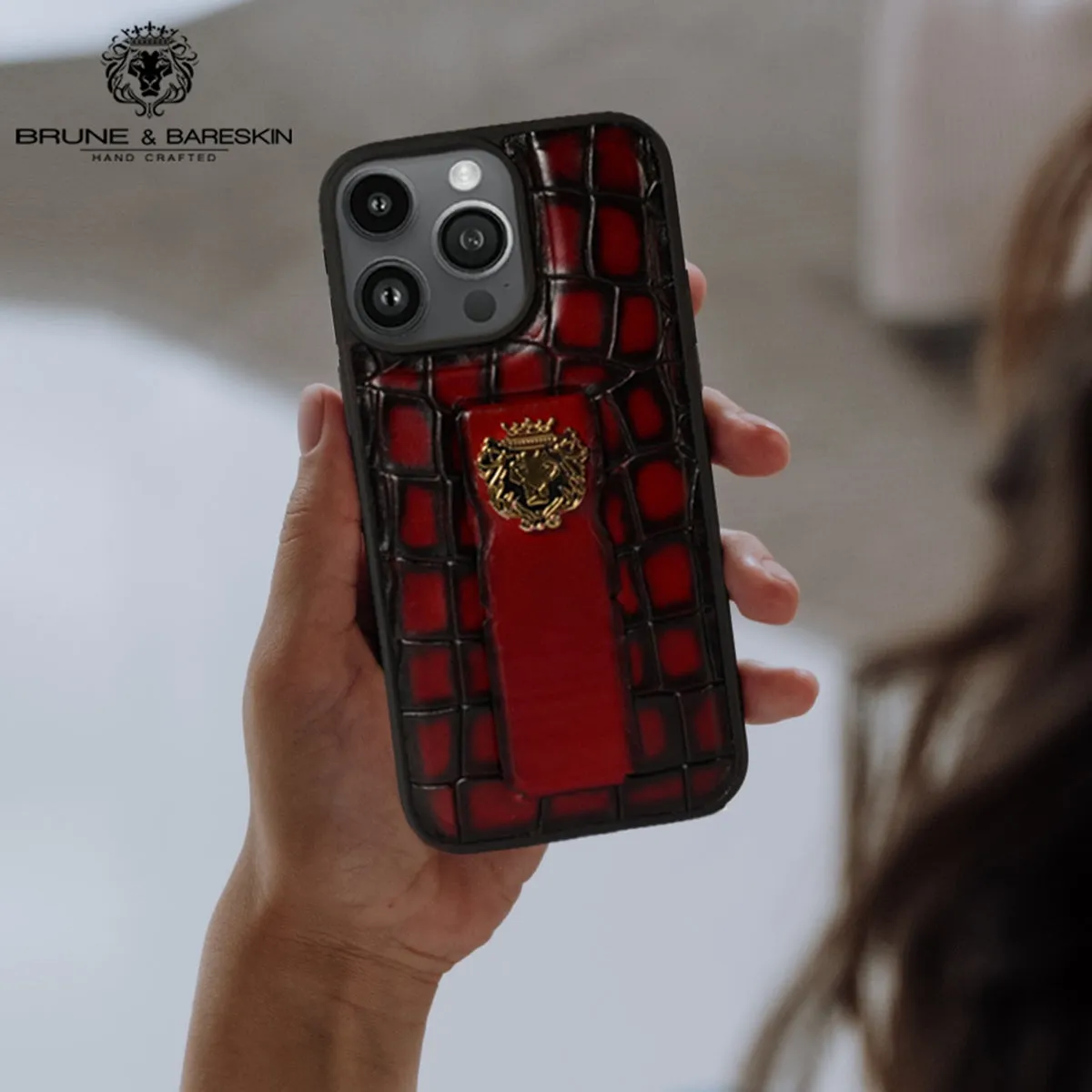 iPhone Series Mobile Cover Finger strap cum Stand Smokey Wine Croco Textured Leather with Metal Lion Logo